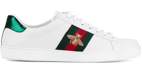 gucci white trainers bee|Gucci boots with bees.